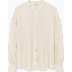 Bluzka "Dorabird" w kolorze kremowym. Białe bluzki damskie American Vintage, m, bez wzorów, z wełny, bez kołnierzyka, bez rękawów. W wyprzedaży za 165,95 zł.