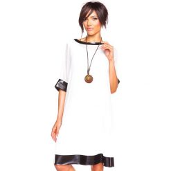Sukienka "Lise" w kolorze białym. Białe sukienki damskie Glamour Paris, s, bez wzorów, bez kołnierzyka, bez rękawów, midi. W wyprzedaży za 109,95 zł.