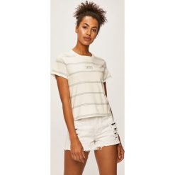 Levi's - T-shirt. Czerwone bluzki damskie Levi's®, s, bez wzorów, z bawełny, z okrągłym kołnierzem. W wyprzedaży za 59,90 zł.