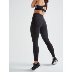 Legginsy fitness cardio 500A damskie. Czarne legginsy sportowe damskie DOMYOS, s, w paski, z elastanu, na fitness i siłownię. Za 89,99 zł.