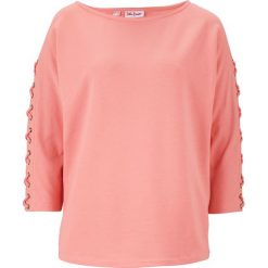 Bluza z ozdobnym sznurowaniem bonprix jasny koralowy. Pomarańczowe bluzy damskie bonprix, bez wzorów, bez rękawów, bez kaptura. Za 99,99 zł.