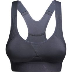 Top ADIDAS BY STELLA McCARTNEY. Szare topy damskie adidas by Stella McCartney, bez wzorów, ze skóry, bez kołnierzyka. W wyprzedaży za 252,00 zł.