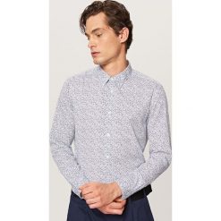 Wzorzysta koszula slim fit - Niebieski. Niebieskie koszule męskie slim marki Reserved, s. Za 99,99 zł.