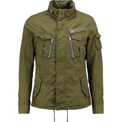 Schott NYC SQUAD Kurtka wiosenna kaki. Brązowe kurtki męskie marki Schott NYC, m, z bawełny. W wyprzedaży za 419,30 zł.