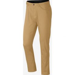 Nike Flex Spodnie Brązowy. Pomarańczowe spodnie męskie Nike, bez wzorów, z elastanu. Za 421,95 zł.