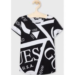 Guess Jeans - Top dziecięcy 118-175 cm. Czarne bluzki dziewczęce z nadrukiem, z elastanu, z okrągłym kołnierzem, krótkie. W wyprzedaży za 89,90 zł.