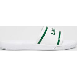 Lacoste - Klapki. Białe klapki damskie marki Lacoste, z materiału. W wyprzedaży za 119,90 zł.