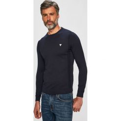 Guess Jeans - Sweter. Niebieskie swetry męskie Guess Jeans, s, z aplikacjami, z bawełny, z okrągłym kołnierzem, bez kaptura. W wyprzedaży za 219,90 zł.