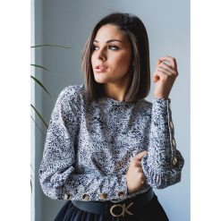 BLUZKA RIKO BLACK&WHITE - M. Czarne bluzki damskie Fanaberia.com, s, bez wzorów, z materiału, eleganckie, z koszulowym kołnierzykiem, bez rękawów. Za 109,00 zł.