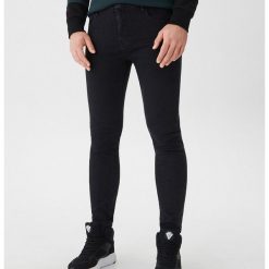 Jeansy skinny - Czarny. Czarne jeansy damskie marki House, bez wzorów, z jeansu. Za 59,99 zł.
