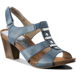 Sandały CAPRICE - 9-28309-20 Denim Waxy Nap 867. Niebieskie klapki damskie Caprice, bez wzorów, ze skóry ekologicznej, bez obcasa, na obcasie. W wyprzedaży za 179,00 zł.