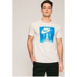 Nike Sportswear - T-shirt. Szare bez kategorii marki Nike Sportswear, s, z nadrukiem, z bawełny, z okrągłym kołnierzem. Za 119,90 zł.