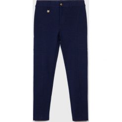 Polo Ralph Lauren - Legginsy dziecięce 128-176 cm. Niebieskie spodnie dziewczęce Polo Ralph Lauren, bez wzorów, z elastanu. W wyprzedaży za 239,90 zł.