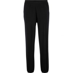 Spodnie shirtowe z wpuszczanymi kieszeniami Loose Fit bonprix czarny. Czarne spodnie damskie bonprix, w paski. Za 79,99 zł.