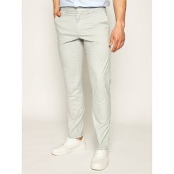 Spodnie materiałowe Tommy Hilfiger Tailored MERCEDES-BENZ Chino TT0TT07196. Szare jeansy męskie Tommy Hilfiger Tailored, m, bez wzorów. Za 649,00 zł.