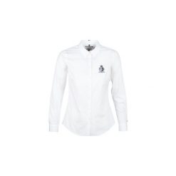 Koszule Tommy Hilfiger TH ESSENTIAL SHIRT LS W3. Białe koszule damskie TOMMY HILFIGER, bez wzorów, bez kołnierzyka, bez rękawów. Za 399,00 zł.