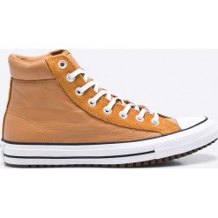 Converse - Trampki Chuck Taylor All Star. Żółte trampki męskie marki Converse, ze skóry, na sznurówki. W wyprzedaży za 299,90 zł.