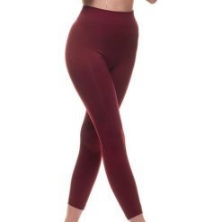 Legginsy modelujące w kolorze czerwonym. Czerwone legginsy sportowe damskie Liposlim, s, ze skóry. W wyprzedaży za 107,95 zł.