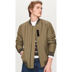 Kurtka typu bomber - Khaki. Brązowe kurtki dziewczęce Reserved. W wyprzedaży za 49,99 zł.