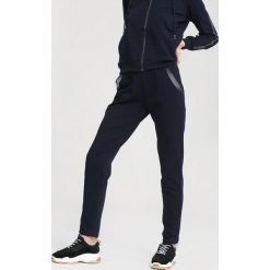 Granatowe Spodnie Dresowe Egoist. Niebieskie spodnie dresowe damskie other, s, z dresówki. Za 59,99 zł.