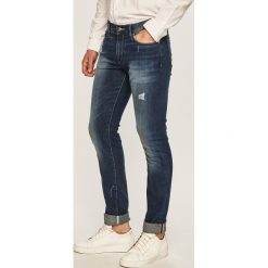 Armani Exchange - Jeansy J13. Niebieskie jeansy męskie Armani Exchange, bez wzorów. Za 499,90 zł.