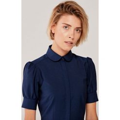 Sukienka Gemma wełniana granatowa niebieski 46. Niebieskie sukienki damskie s, z elastanu, krótkie, mini, rozkloszowane. Za 797,00 zł.