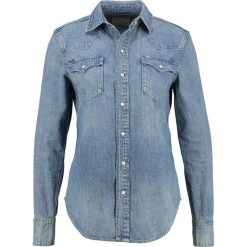 Polo Ralph Lauren APLEY Koszula medium indigo. Niebieskie koszulki damskie polo Polo Ralph Lauren, xs, bez wzorów, z bawełny, polo, bez rękawów. Za 649,00 zł.