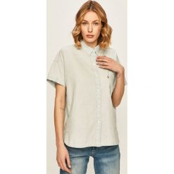 Levi's - Koszula. Niebieskie bluzki damskie Levi's®, na co dzień, s, bez wzorów, z bawełny, klasyczne, z klasycznym kołnierzykiem, z krótkim rękawem. W wyprzedaży za 149,90 zł.