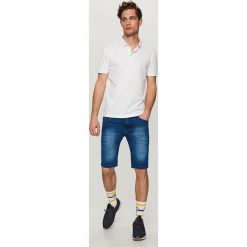 Jeansowe szorty SLIM FIT - Granatowy. Niebieskie spodenki jeansowe męskie Reserved. W wyprzedaży za 29,99 zł.