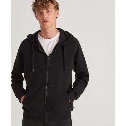 Rozpinana bluza z bawełny organicznej - Czarny. Czarne bluzy męskie Reserved, s, bez wzorów, z bawełny, bez kołnierzyka, bez rękawów, bez kaptura. Za 99,99 zł.