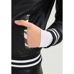 Goosecraft RIGA BOMBER Kurtka skórzana black. Czarne marynarki damskie Goosecraft, l, bez wzorów, ze skóry. W wyprzedaży za 648,45 zł.