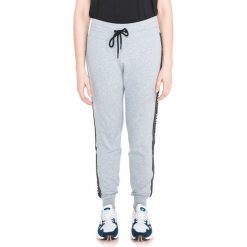 DKNY Spodnie dresowe Szary. Szare spodnie damskie DKNY, m, bez wzorów, z elastanu. Za 343,95 zł.