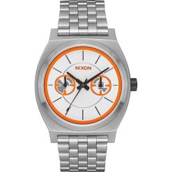 Zegarek kwarcowy "Time Teller Deluxe" w kolorze srebrno-białym. Szare, analogowe zegarki męskie Nixon, ze stali. W wyprzedaży za 219,95 zł.