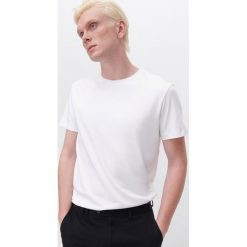 T-shirt basic z bawełny -. T-shirty męskie Reserved, s, bez wzorów, z bawełny, bez kołnierzyka. Za 69,99 zł.