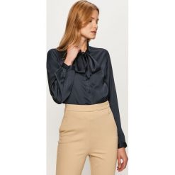 Jacqueline de Yong - Koszula. Białe bluzki damskie Jacqueline de Yong, bez wzorów, z poliesteru, eleganckie, bez kołnierzyka, z długim rękawem. Za 119,90 zł.