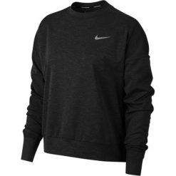 Bluzka Nike Therma Sphere Long Sleeve Top W Czarna. Czarne topy damskie Nike, bez wzorów, z materiału, bez kołnierzyka. Za 149,99 zł.