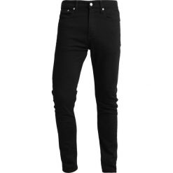 Calvin Klein Jeans 016 SKINNY Jeans Skinny Fit stay black. Czarne jeansy męskie marki Calvin Klein Jeans, z elastanu. Za 419,00 zł.