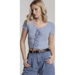 Niebieska Bluzka Zhanella. Niebieskie topy damskie Renee, s, bez wzorów, bez kołnierzyka. Za 39,99 zł.
