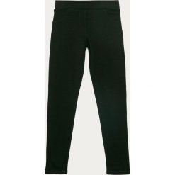 Guess Jeans - Legginsy dziecięce 116-175 cm. Czarne spodnie dziewczęce Guess Jeans, z aplikacjami, z elastanu. Za 179,90 zł.