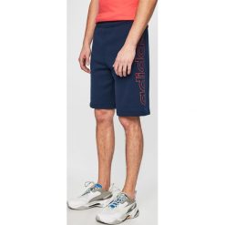 Adidas Originals - Szorty. Niebieskie spodenki i szorty męskie adidas Originals, s, z nadrukiem, z bawełny, casualowe. W wyprzedaży za 159,90 zł.