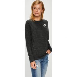 Nike Sportswear - Bluzka. Czarne bluzki asymetryczne Nike Sportswear, m, z bawełny, z okrągłym kołnierzem. W wyprzedaży za 169,90 zł.