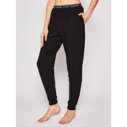 Spodnie dresowe Calvin Klein Underwear 000QS6429E. Szare spodnie damskie Calvin Klein Underwear, m, z elastanu. Za 229,00 zł.