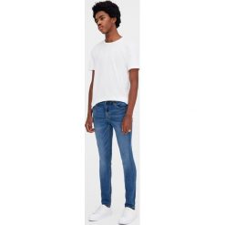 Jeansy superskinny fit. Niebieskie jeansy męskie marki Pull&Bear, m, bez wzorów. Za 89,90 zł.
