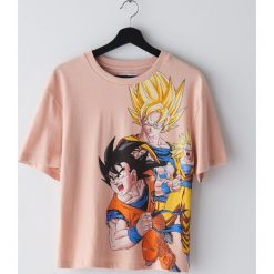 Koszulka Dragon Ball - Różowy. Różowe koszulki damskie Cropp, s, bez wzorów, bez kołnierzyka, bez rękawów. Za 59,99 zł.