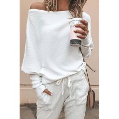 Bluzka damska GINNY WHITE. Białe bluzki damskie IVET, na co dzień, xl, bez wzorów, z materiału, eleganckie, bez kołnierzyka, bez rękawów. W wyprzedaży za 79,00 zł.