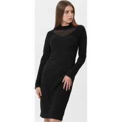 Czarna Sukienka Ivette. Czarne sukienki damskie Born2be, s, bez wzorów, ze stójką, z długim rękawem, długie, midi, dopasowane. Za 99,99 zł.