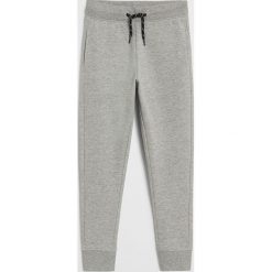Mango Kids - Spodnie dziecięce Francia 110-164 cm. Szare spodnie chłopięce Mango Kids, bez wzorów, z bawełny. Za 45,99 zł.