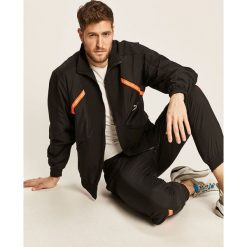 Puma - Kurtka. Czarne płaszcze męskie Puma, s, bez wzorów, z poliesteru, krótkie, bez kaptura. Za 349,90 zł.