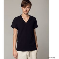 T-shirt męski czarny. Czarne t-shirty męskie Pakamera, m, bez wzorów, z bawełny, bez kołnierzyka, krótkie. Za 95,00 zł.