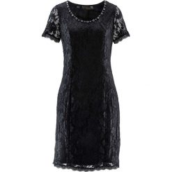 Sukienka koronkowa Premium bonprix czarny. Czarne sukienki damskie bonprix, bez wzorów, z koronki, eleganckie, z okrągłym kołnierzem, bez rękawów. Za 199,99 zł.
